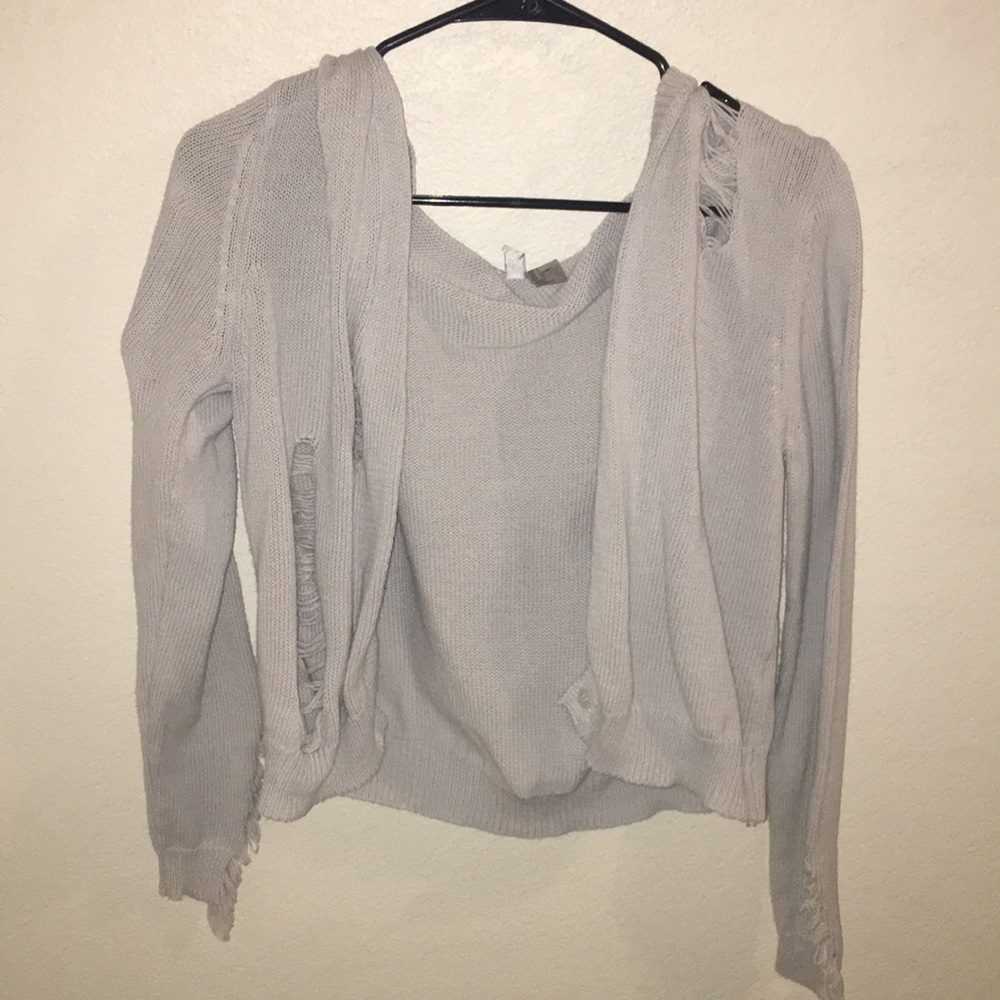 Distressed off-white sweater
